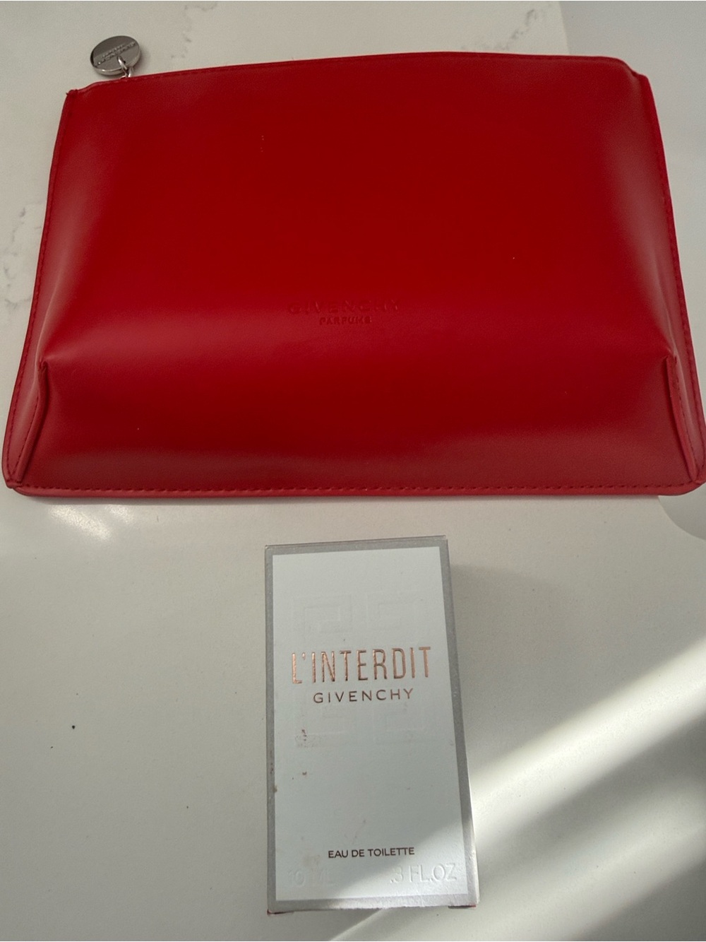 Givenchy L'Interdit Red Cosmetic Pouch and Travel perfume 10ml